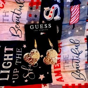 New! Guess heart earrings that are sure to take your breathe away